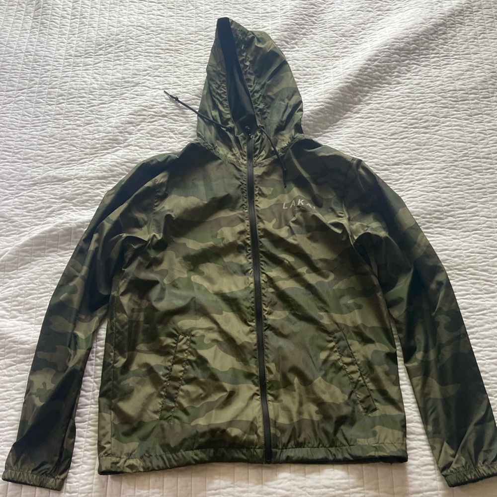 Lakai camo, hooded wind breaker. Size medium.